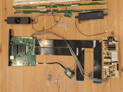 All electronic parts for a 55" TCL 4K UHD Roku TV