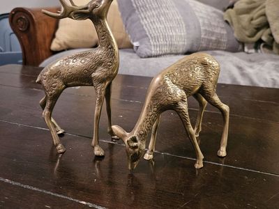 Set of buck and doe brass statues