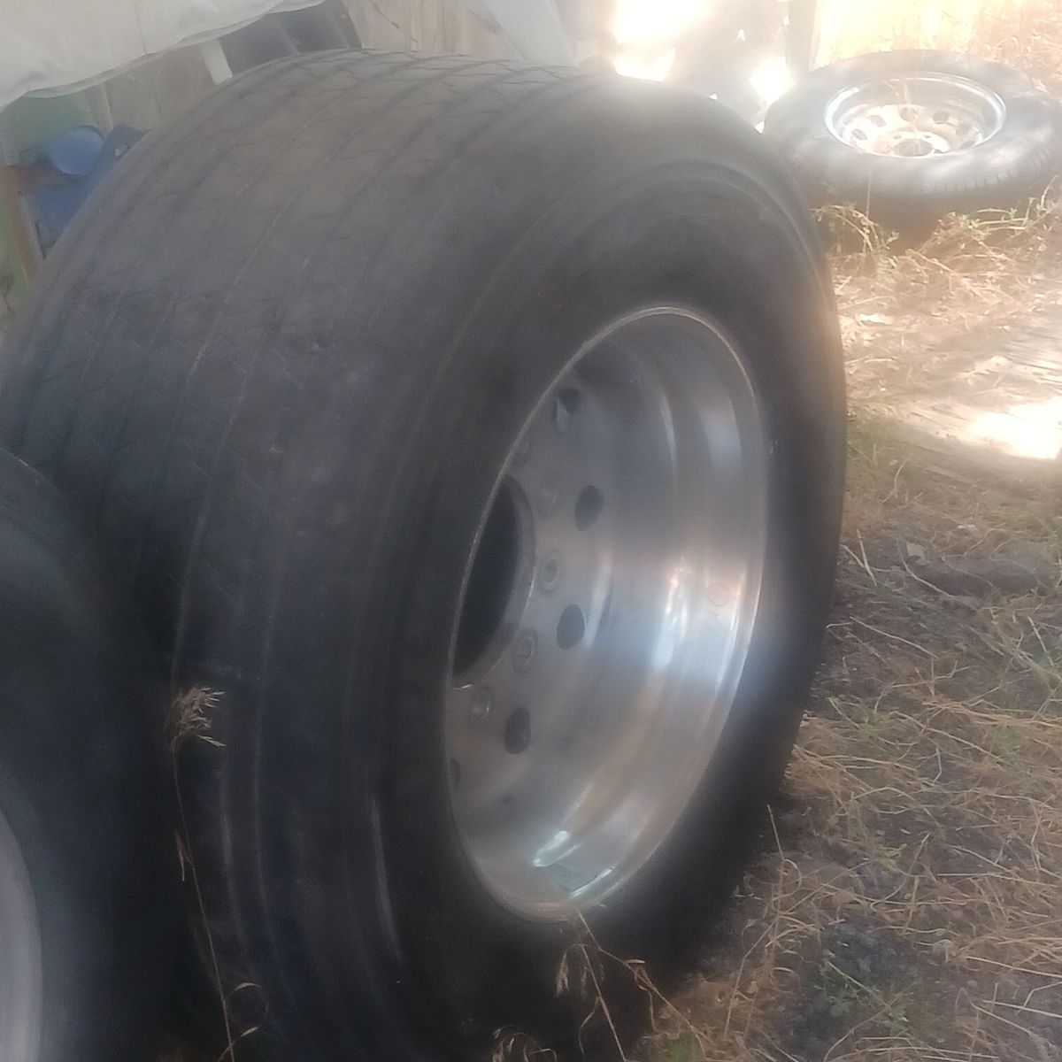 (2) 22.5 super singles on aluminum wheels