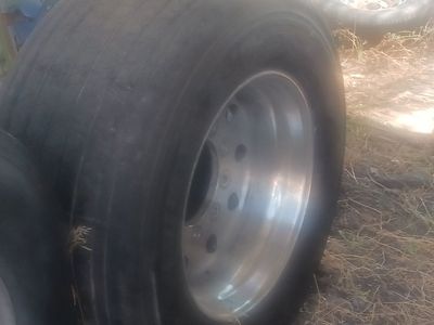 (2) 22.5 super singles on aluminum wheels