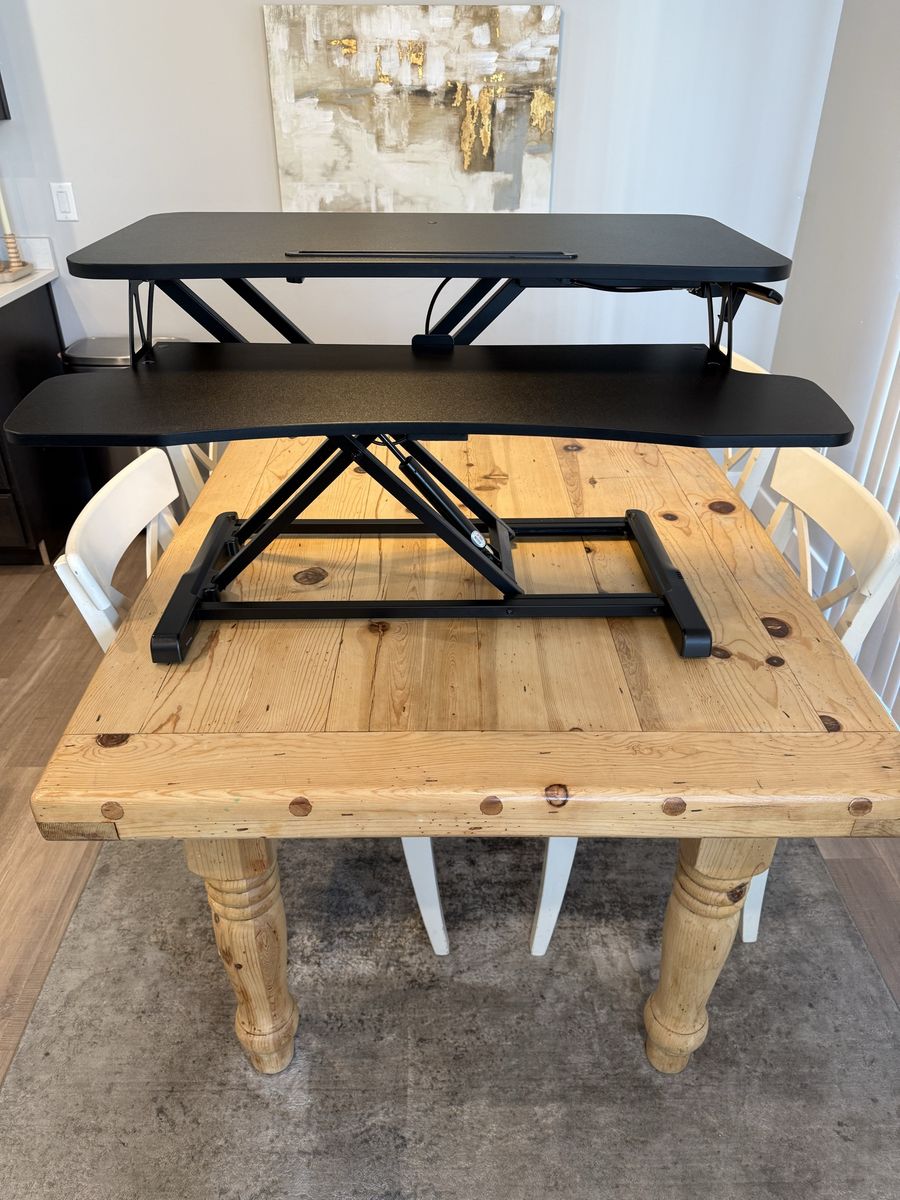 Portable adjustable hydraulic powered desk