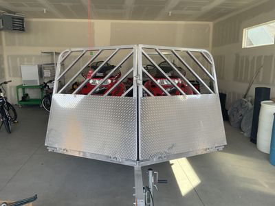 Snowmobiles and trailer