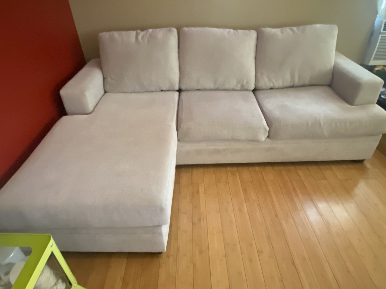 Beige L-shaped sectional sofa
