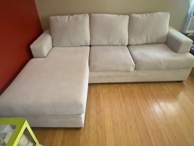 Beige L-shaped sectional sofa