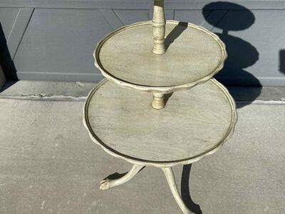Three-tiered pie crust edge table with claw feet