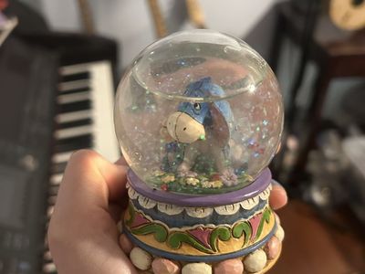 Disney Traditions Showcase Collection Eeyore "Gloom to Bloom" Snow Globe, Official Merchandise