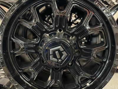 Brand new set of 4 wheels - TIS 18x9.0 lug pattern 8x6.50 gloss black offset +18mm