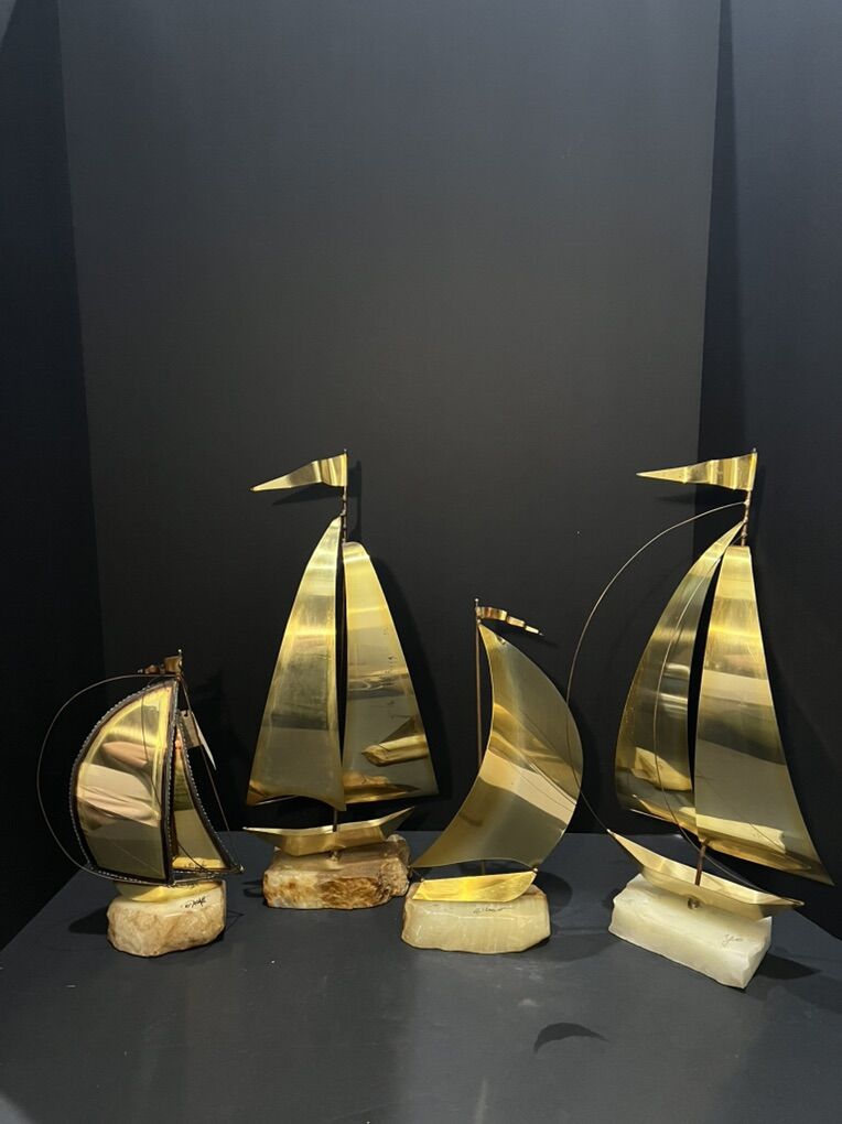 Vintage modern brass and onyx sailboat sculptures