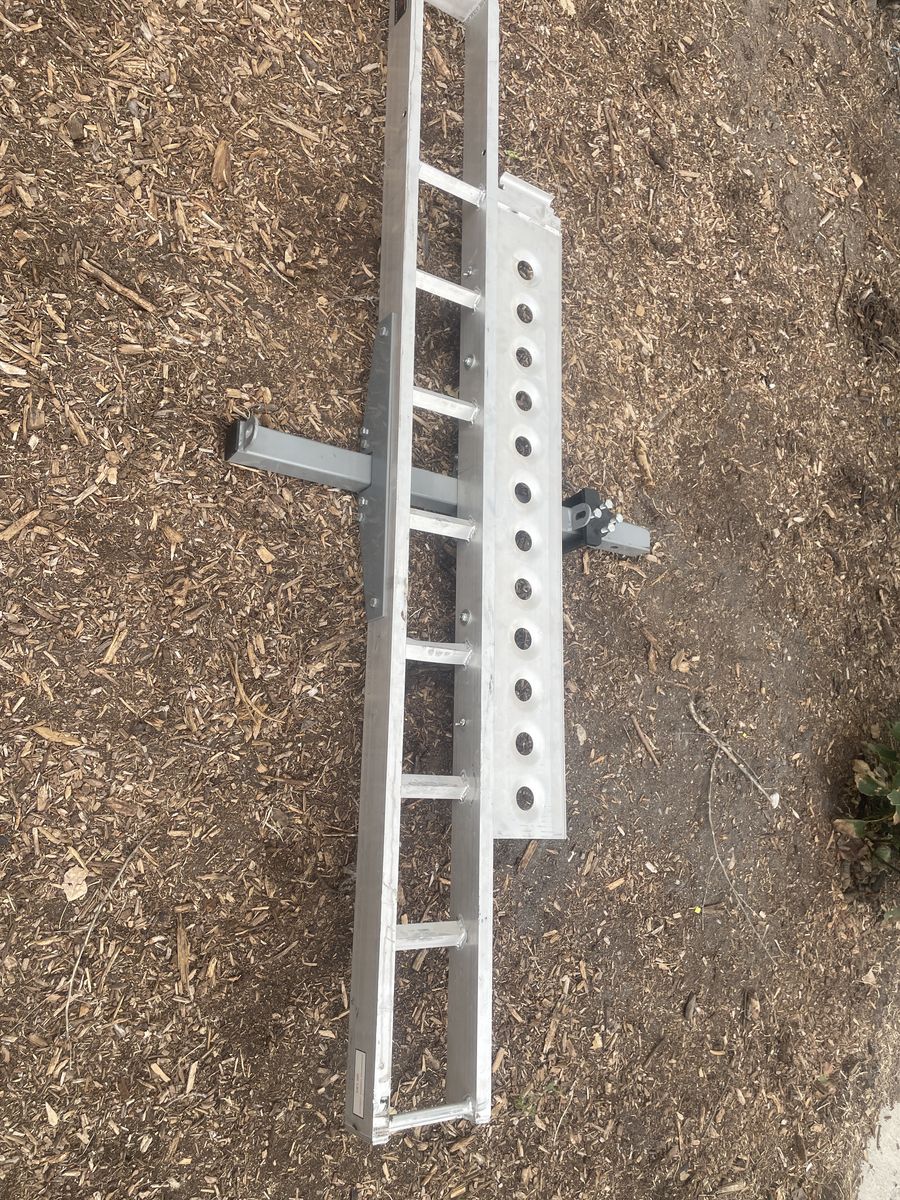 Motorcycle hitch carrier