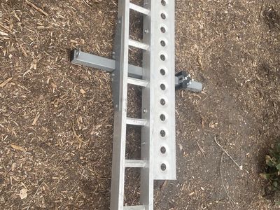 Motorcycle hitch carrier