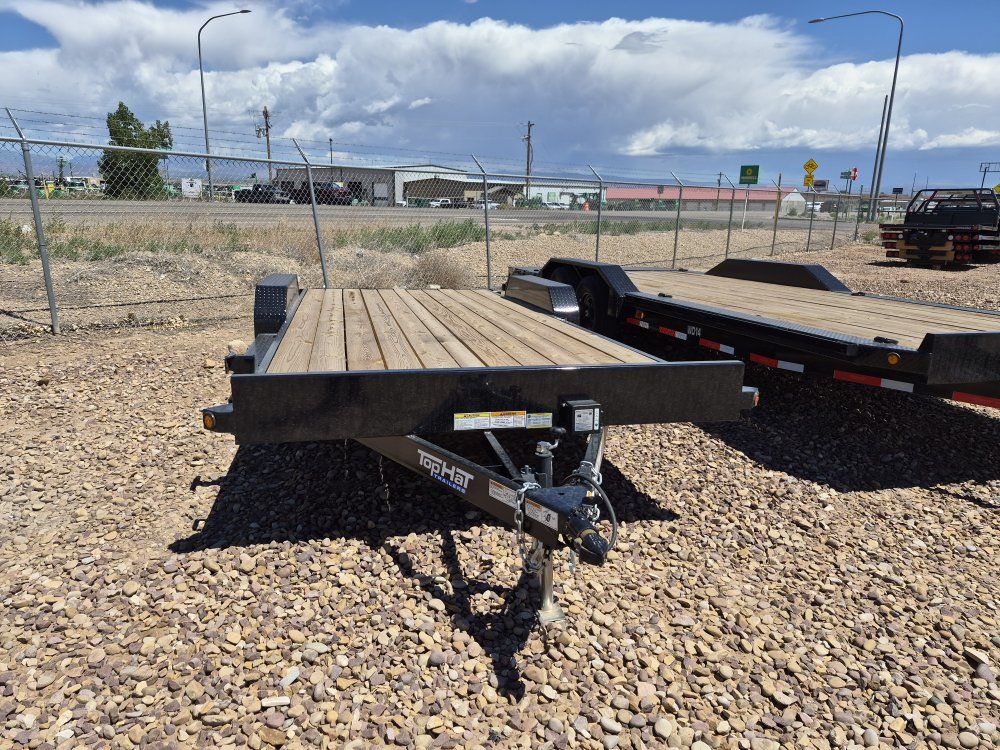 Top Hat Flatbed Utility trailer, 20' long with ramps.