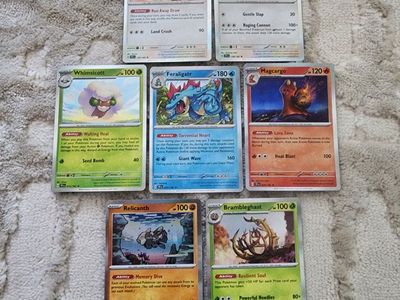 7 Pokémon TCG Cards: Dudunsparce, Drampa, Whimsicott, Feraligatr, Magcargo, Relicanth, Brambleghast