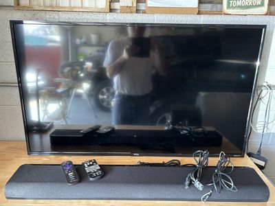 43" TCL Roku TV Television with a YAMAHA Soundbar
