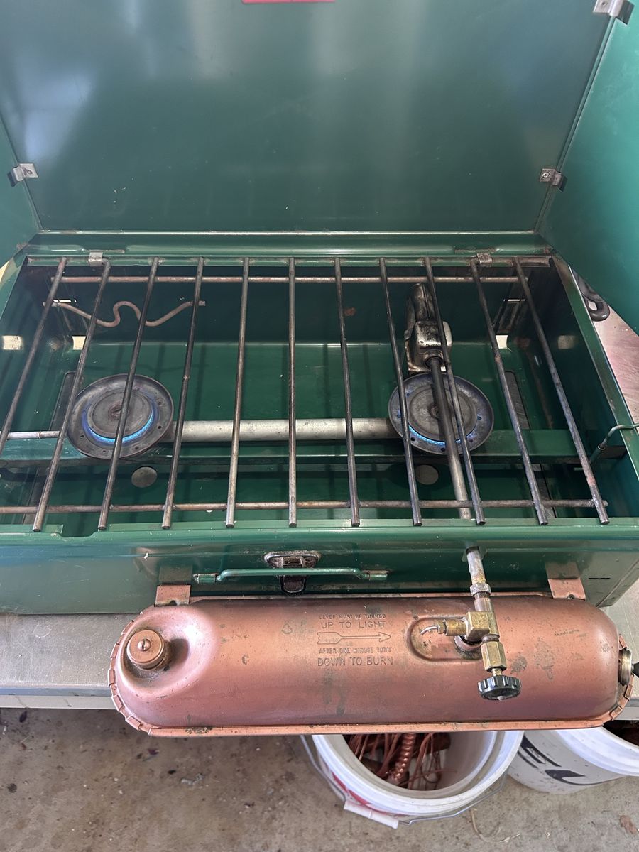 Coleman stove model 413E , with gold tank.