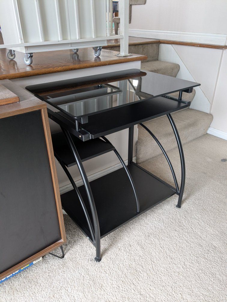 Small glass-top computer desk