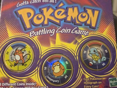 Pokemon vintage coins and book