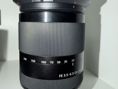 Sony FE 24-240mm f/3.5-6.3 OSS FE-Mount Zoom Lens with Hood & B+W UV Haze Filter