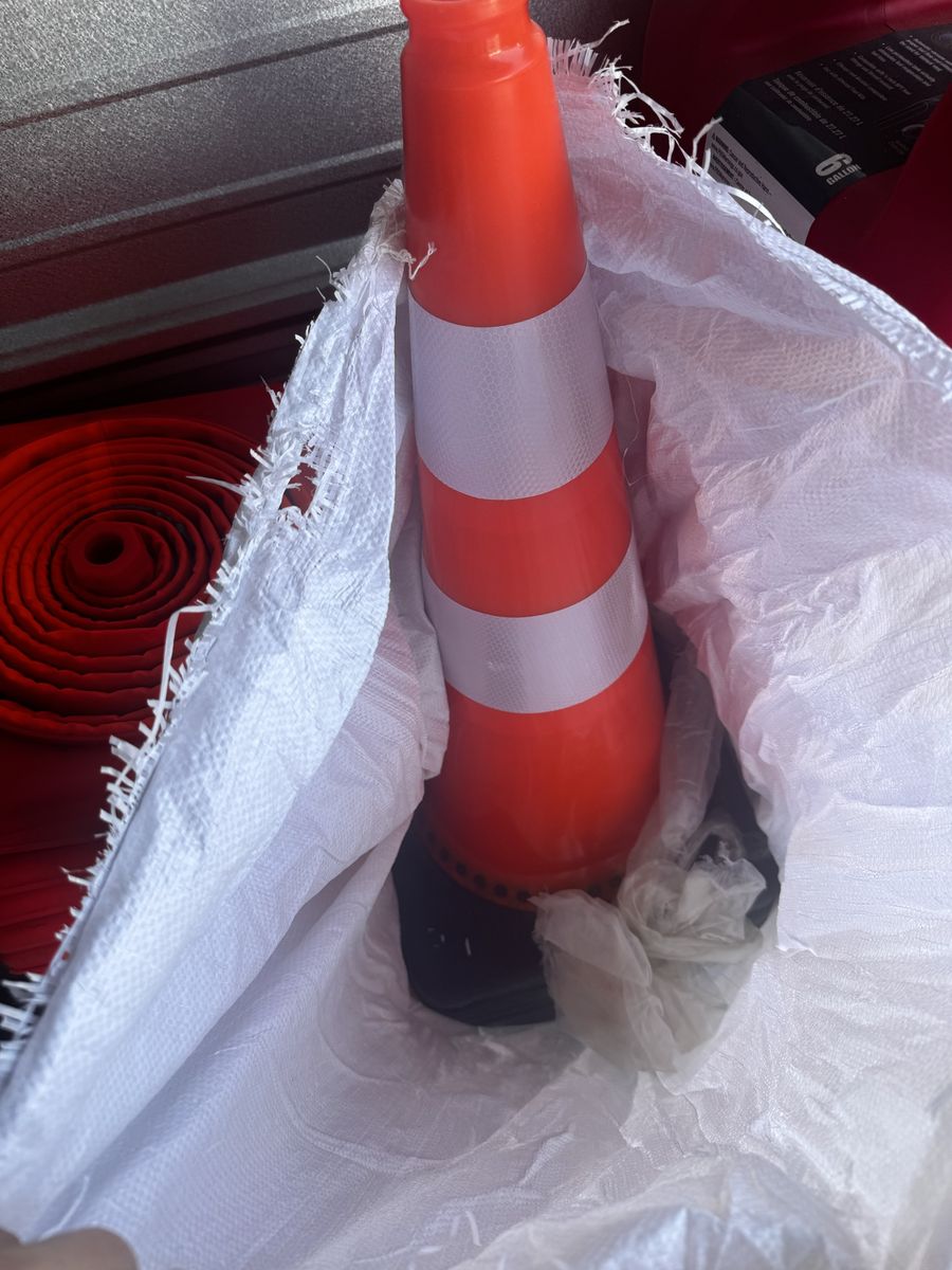 Orange Safety Traffic Cone with Reflective Collars and Black Base