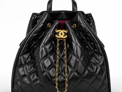 Black Quilted Leather Drawstring Backpack with Gold-Tone Chain Straps
