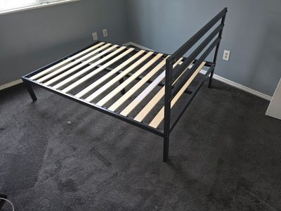 full size bed frame in great shape. needs a mattress. make me an offer.
