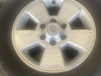4 17 INCH TOYOTA 6 LUG FACTORY RIMS AND TIRES FOR TACOMA AND FIRST GEN TUNDRAS