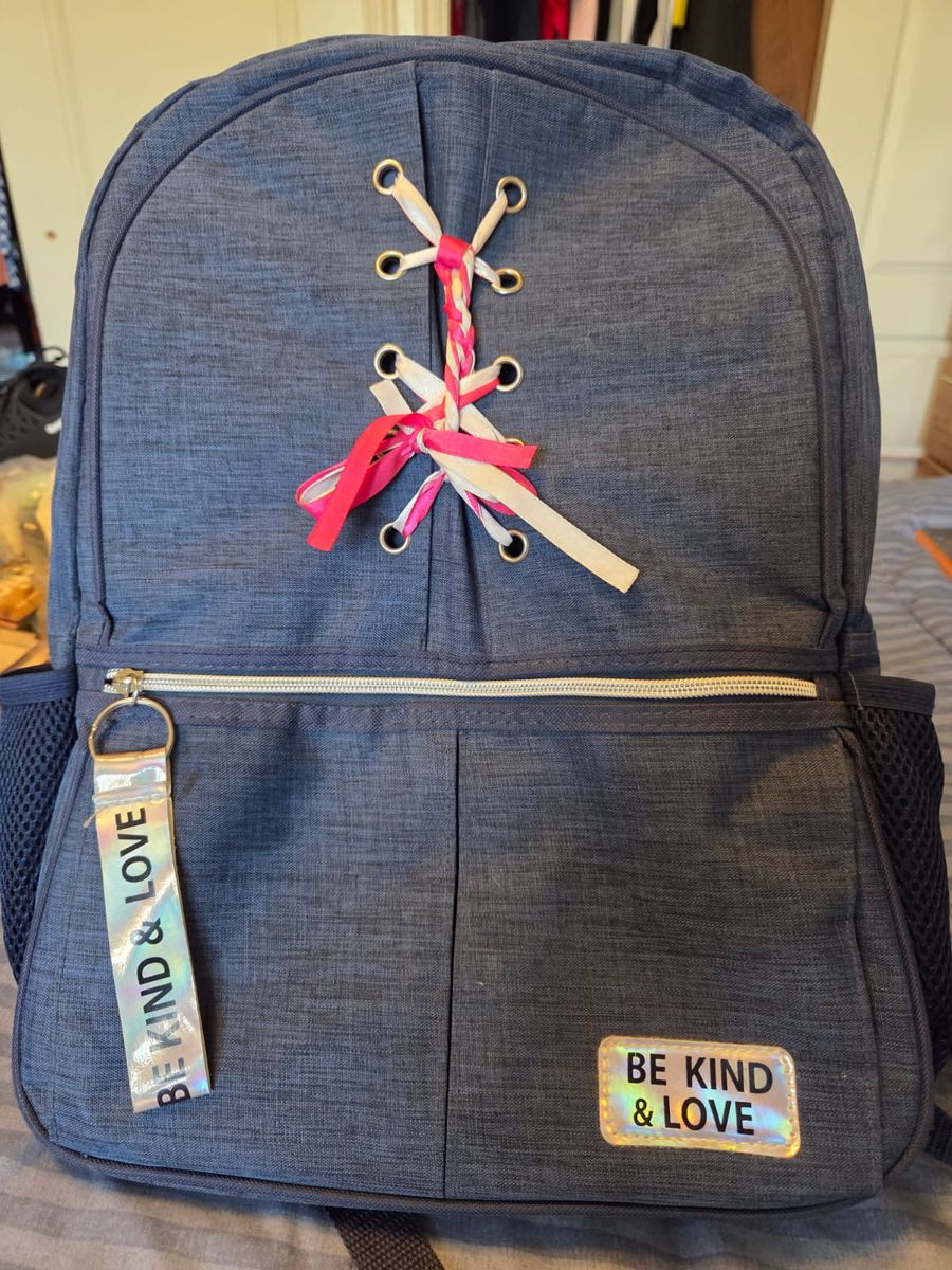Stylish Blue Backpack with "Be Kind & Love" Tag and Ribbon Lacing Detail - Great for School or Travel