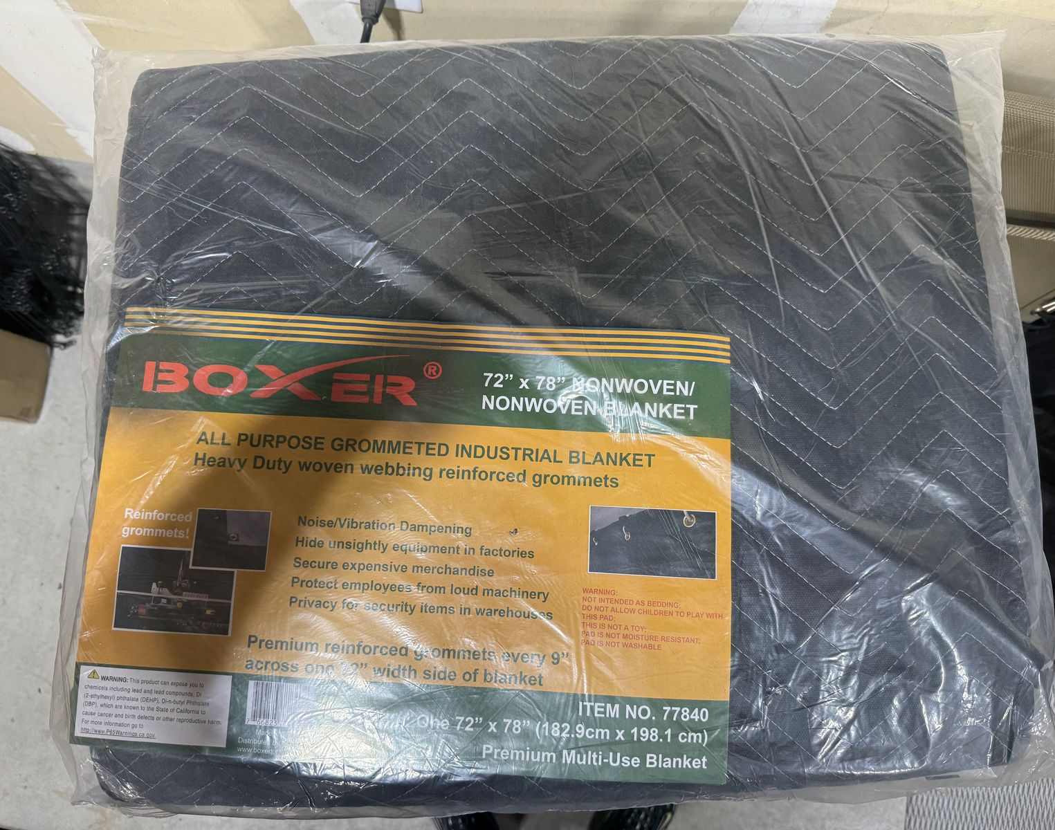 Industrial, heavy-duty moving blanket or noise insulating blanket