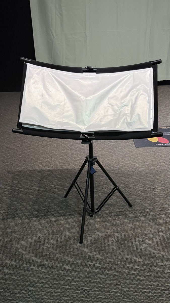 Photographic curved clamshell/reflector panel...