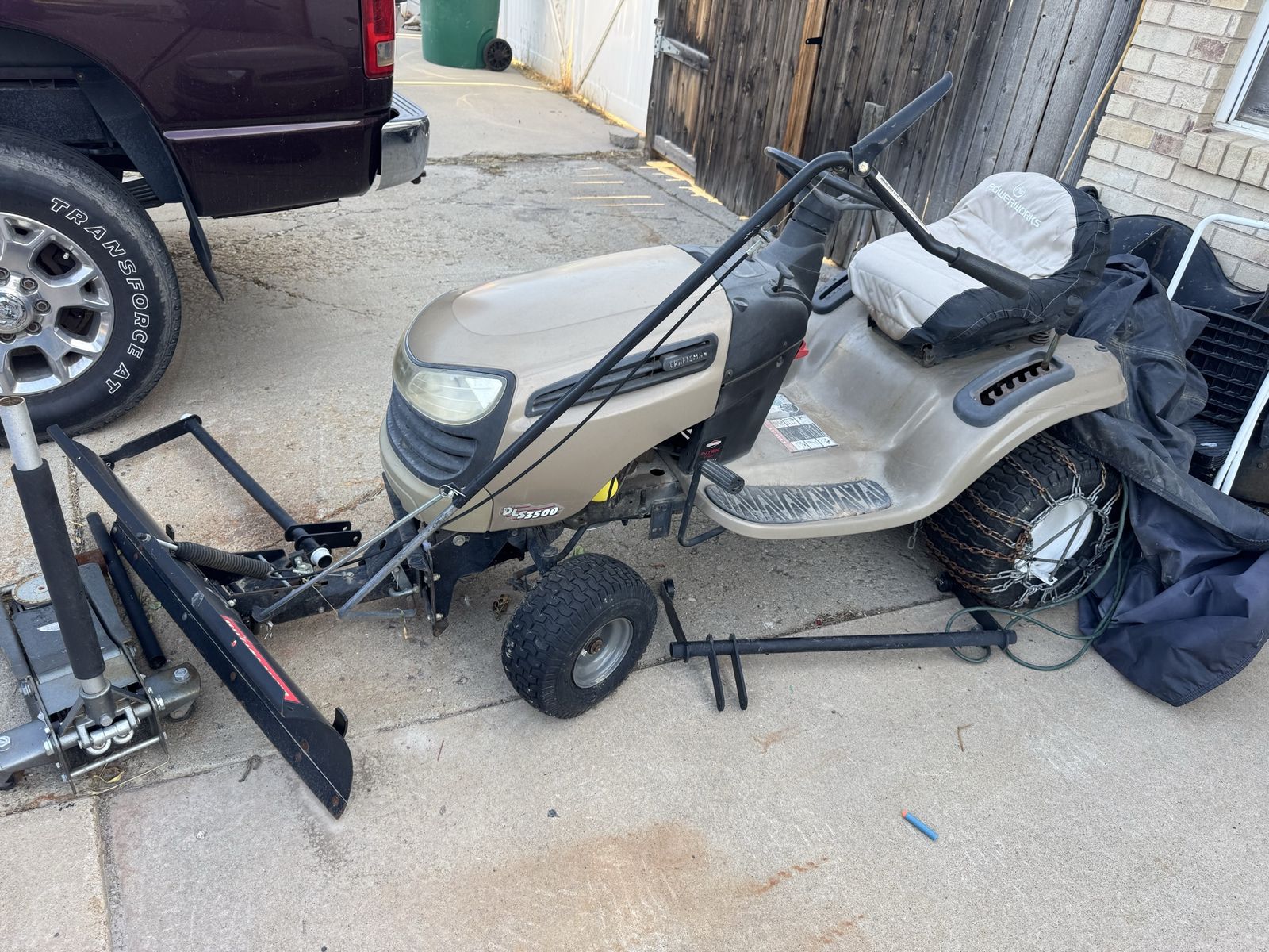 Craftsman DLS3500 Riding Lawn Mower with Snow Plow Blade and Tire Chains