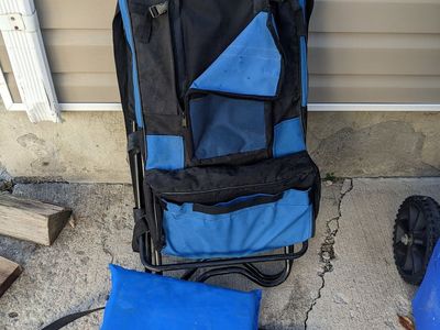 Clam Ice Fishing Backpack Chair with Storage and Bass Pro Shops Cushion