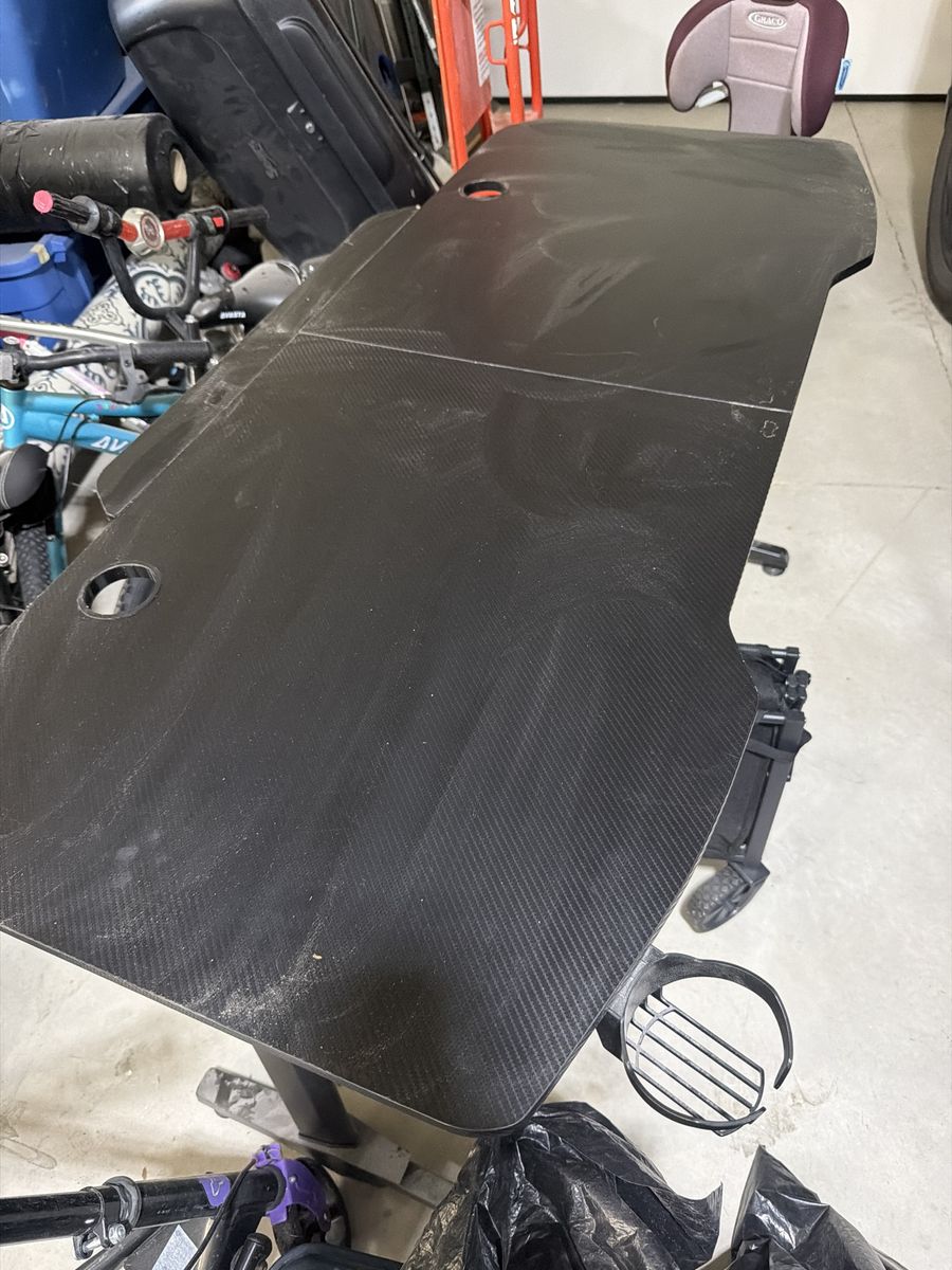 Black Gaming Desk with Carbon Fiber Texture, Cup Holder, and Cable Management