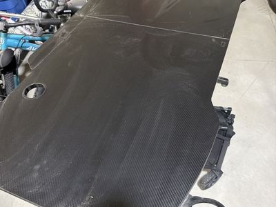 Black Gaming Desk with Carbon Fiber Texture, Cup Holder, and Cable Management