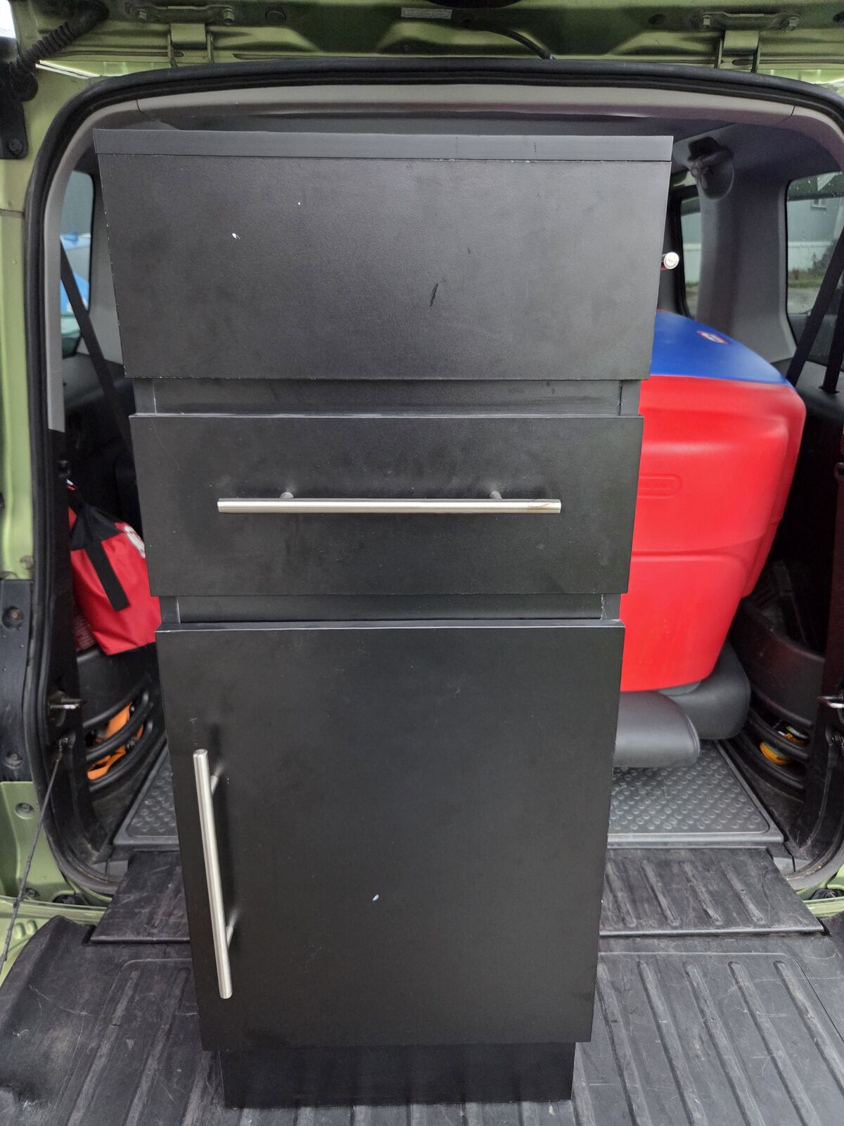 black salon styling station drawer with stainless steel appliance holders cosmetology