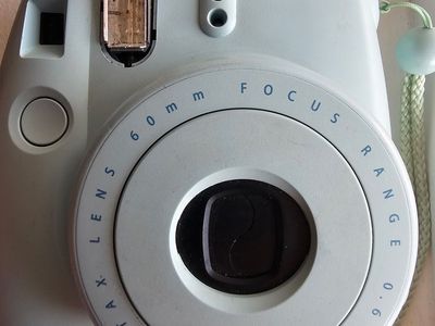 Sage green Fuji film camera