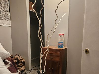 Metal vase with 4 sticks