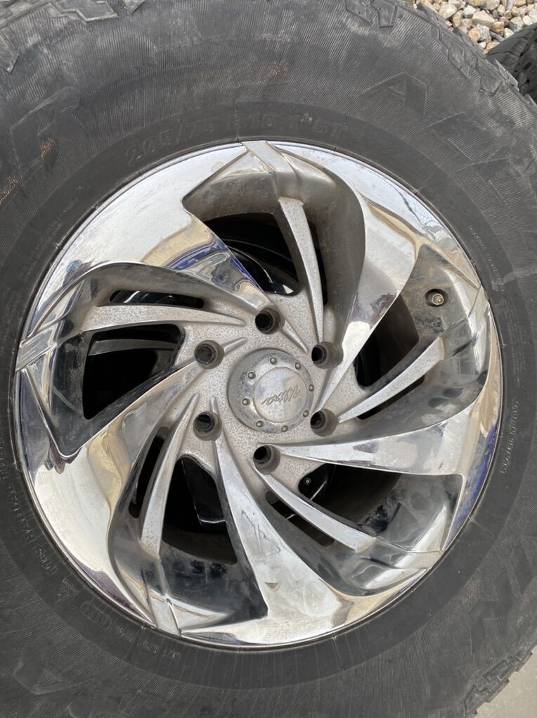 4- 265 65R16 Tires and Wheels