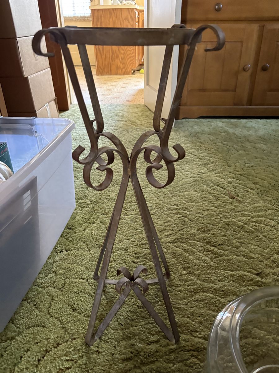 Antique iron plant stand