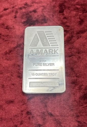 10 Troy Ounce Silver Bullion Coins of 999 Fine Silver from A-Mark, weighing 10 ounces with no minimum purchase.