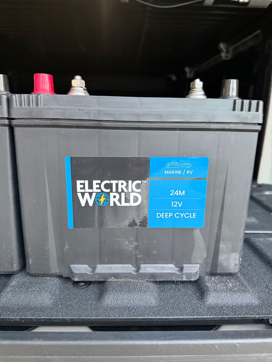 (2) Deep cycle 12V marine and RV battery is an Electric World 24M model.