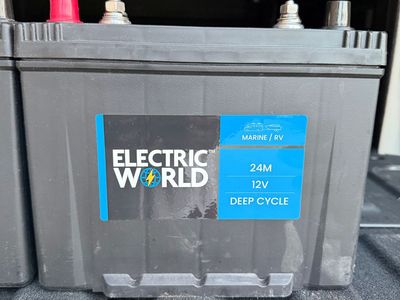 (2) Deep cycle 12V marine and RV battery is an Electric World 24M model.