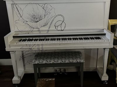 Upright piano and bench
