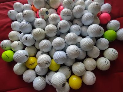 110 used golf balls