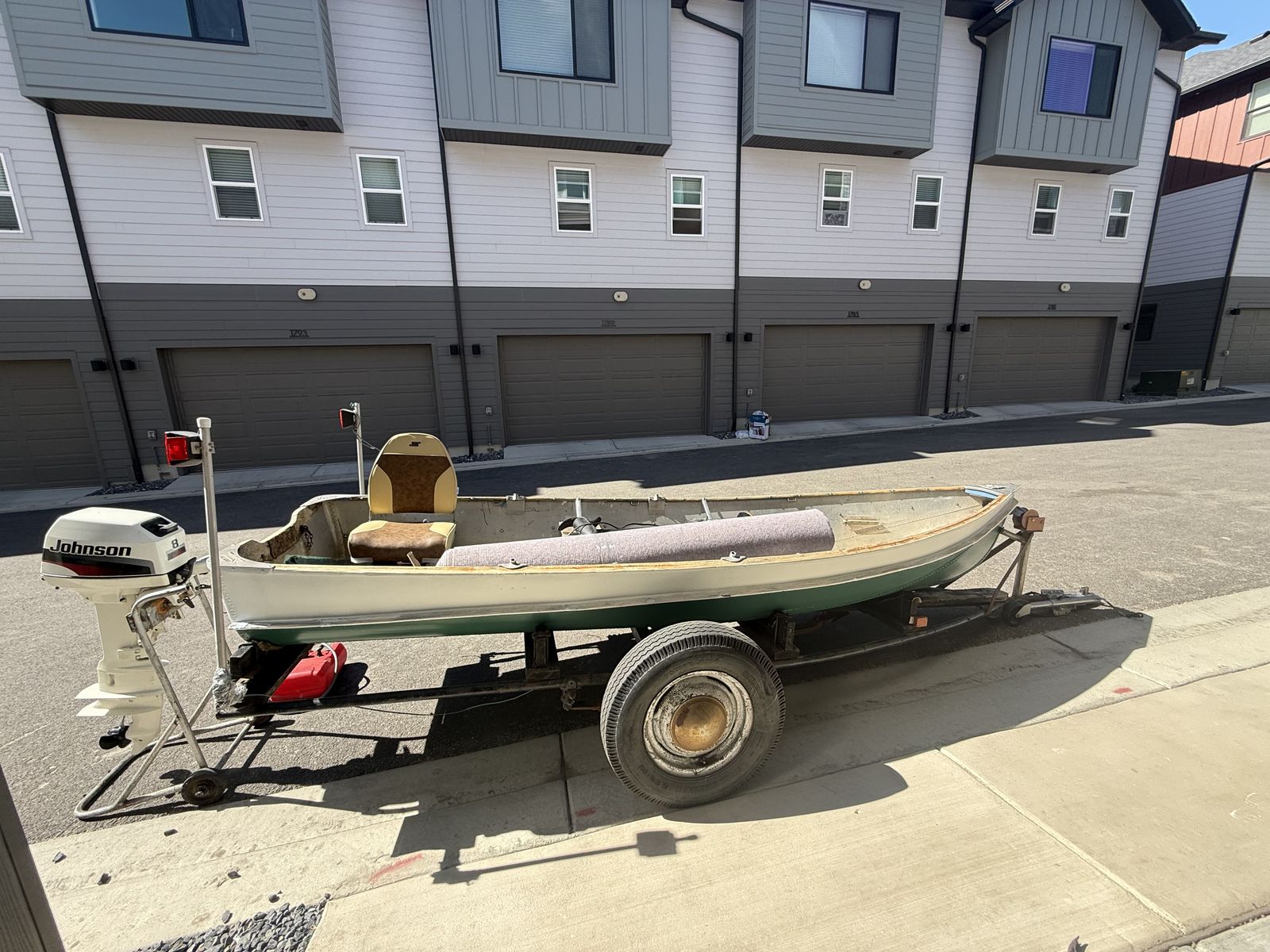 14 foot aluminum boat with a 8 hp Johnson motor