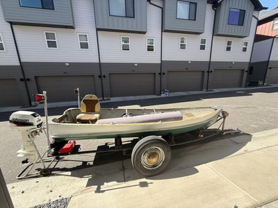14 foot aluminum boat with a 8 hp Johnson motor