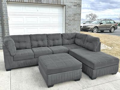 Delivery Available - Dark Gray Sectional Couch & Ottoman