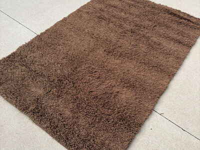 Brown shag rug