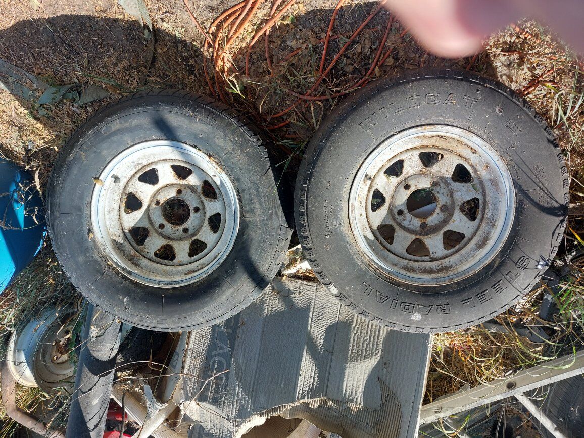 5 x 5.5 aftermarket steel white spoke rims ford do