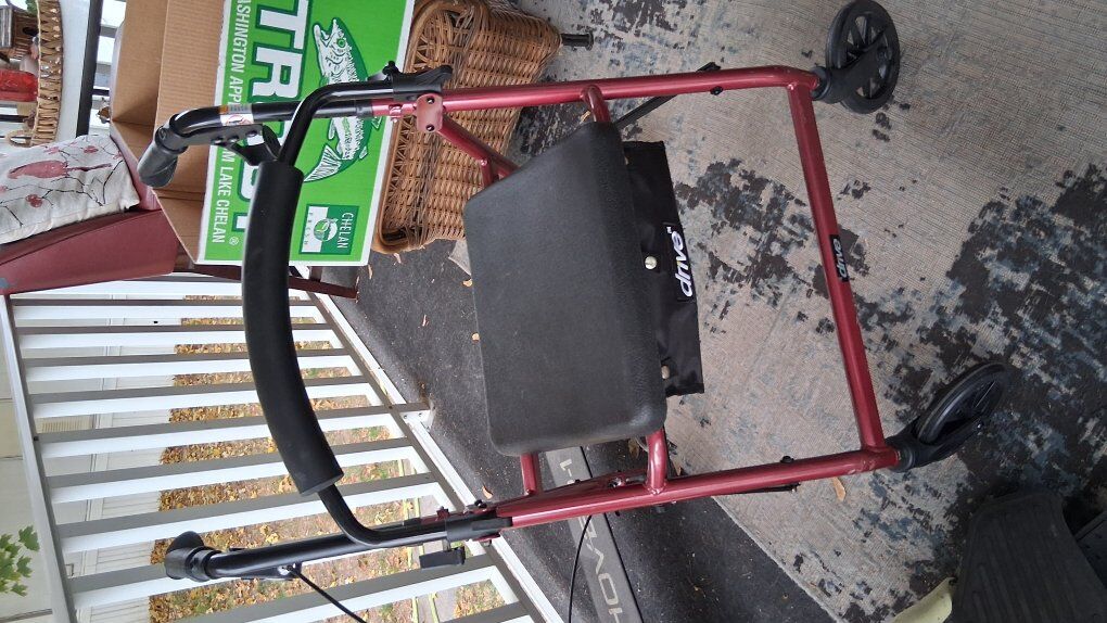 Drive Medical rollator walker with a seat