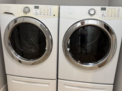 Frigidaire Affinity front-load washer and dryer with matching pedestal drawers