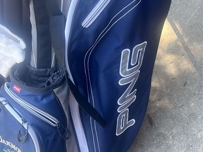 Ping golf bag and Taylor made clubs